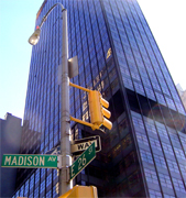 Madison Square Garden, often abbreviated as MSG, known colloquially simply as The Garden, has been the name of four arenas in New York City, NY. It is also the name of the entity which owns the arena and several of the professional sports franchises which play there. There have been four incarnations of the arena. The first two were located at the Northeast corner of Madison Square (Madison Ave. & 26th St.) from which the arena derived its the name