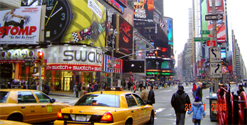 Broadway's huge number of animated neon and television-style signage have long made it one of New York's iconic symbols, and a symbol of the intensely urban Manhattan. Times Square is the only neighborhood in New York with a zoning ordinance requiring tenants to display bright signs. The density of illuminated signs in Times Square now rivals Las Vegas... Broadway theater's area it is located at Time Square Manhattan New York City