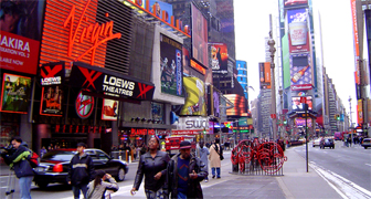 Broadway's huge number of animated neon and television-style signage have long made it one of New York's iconic symbols, and a symbol of the intensely urban Manhattan. Times Square is the only neighborhood in New York with a zoning ordinance requiring tenants to display bright signs. The density of illuminated signs in Times Square now rivals Las Vegas... Broadway theater's area it is located at Time Square Manhattan New York City