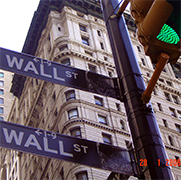 Wall street and NYSE financial centre in downtown New York City Luxurious but unmarket, like a prestigious private club, the Morgan building was nevertheless so well known that when, in 1920, a wagon exploded across the street killing 30 people, it was simply assumed-though never proven that an anarchist bomb had been aimed at the bank. The pockmarks on the bank's wall street facade have been left deliverately unrepaired, and can still be seen today