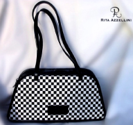 Rita Azzellini offers you an exclusive collection of fine leather fashion handbags, vip chess collection very elegant, prestigious and high qualitative handbags, perfectly well-finished and exclusively hand-made by our experienced italian craftsmen to satisfy all our customers, also the most exacting and sophisticated people.