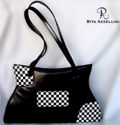 Rita Azzellini offers you an exclusive collection of fine leather fashion handbags, vip chess collection very elegant, prestigious and high qualitative handbags, perfectly well-finished and exclusively hand-made by our experienced italian craftsmen to satisfy all our customers, also the most exacting and sophisticated people. we use for each handbag a very soft kidskin leather, treated and made in Italy. This type of leather guarantee an elegant finished ladies handbag crafted. Our collection designed and created from exquisite kid skin leather features a stunning design to VIP women, for elegant women and to support Boutiques and luxury handbags distributors round the world