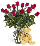 Perfect RED Roses, Teddy bear in a clear base, greens and white fillers special Roses Arrangement for Valentine and Romance for an exigent lady... We have a complete Online Flowers Selection for Anniversary, Birthday, Romance, Get well soon, New born, Funeral, Sympathy, Thanksgiving, Christmas, Mother's day, Father's day, Secretary, Boss, Easter, Spring and our fantastic Miami Tropical and Exotic flowers arrangements