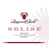 "Solise" D.O.C. "Brindisi" Rosé wine, grapes: Negroamaro 100%, The grapes are picked and carried to the winery on small carts. After crushing and stemming the product is introduced into a wine-making inox tanks where it is mixed up with peels annd must for 3-4 hours. After racking the must can ferment without peels under controlled tamperature in tanks of 50 hl. Alcohol 12,10 % vol. Total acidity 5,60 g/l Total sulphorous dioxide 80 mg/l pH 3,56 Gastonomic combination Hors d’oevre, soups, boiler meats, fish sauces,white meat, cheese and pizza